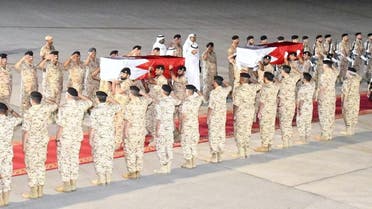 The arrival of the bodies of two Bahrain Defense Force officers, who were killed in a Houthi drone attack near the border with Yemen, Sept. 26, 2023. (Reuters)