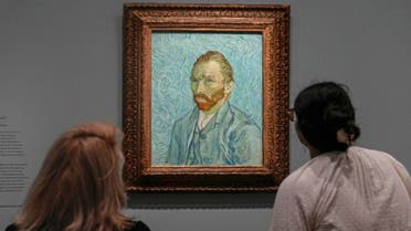People look at Vincent Van Gogh’s oil on canvas painting, ‘Self-portrait,’ 1889, during the press day of the Van Gogh in Auvers-sur-Oise: The Final Months exhibition at the Musee d’Orsay in Paris, on September 29, 2023. (Reuters)