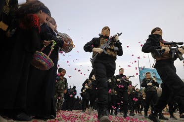 Palestinian militants of the Islamic Jihad movement participate in an anti-Israel military parade marking the 36th anniversary of the movement's foundation in Gaza City, October 4, 2023. (Reuters)