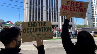 Pro-Palestinian demonstrators chant slogans outside the Israeli consulate in Atlanta on Sunday, Oct. 8, 2023. (AP)