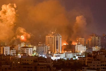 Flames and smoke billow during Israeli strikes in Gaza, October 9, 2023. (Reuters)