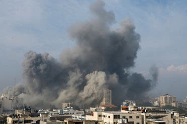 Smoke billows following Israeli strikes, in the northern Gaza Strip, October 11, 2023. (Reuters)