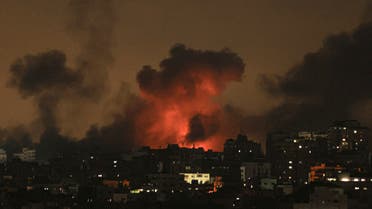 Explosions illuminate the sky during Israeli strikes on Gaza City on October 10, 2023. (AFP)