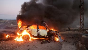 A journalist’s car burns at the site where Reuters videojournalist Issam Abdallah was killed and six others were injured when missiles fired from the direction of Israel struck them, in Alma Al-Shaab, near the border with Israel, southern Lebanon, on October 13, 2023. (Reuters)