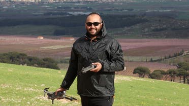 Reuters’ journalist Issam Abdallah holds a drone during an assignment in Western Bekaa, Lebanon, on March 19, 2023. (Reuters)
