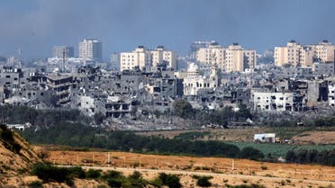 A view shows destroyed buildings in the Gaza Strip as seen from Israel’s border with the Gaza Strip, in southern Israel, October 15, 2023. (Reuters)
