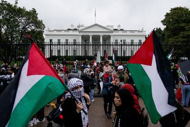 Supporters of the Palestinian people hold a rally and march called a Day of Action for Palestine as the conflict between Israeli and Hamas continues, near the White House in Washington, US, October 14, 2023. (Reuters)