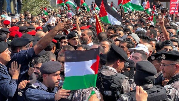 Arab world blames Israel for hospital strike as thousands rally