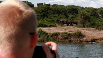 Uganda vows to track down killers of foreign tourists and safari guide 