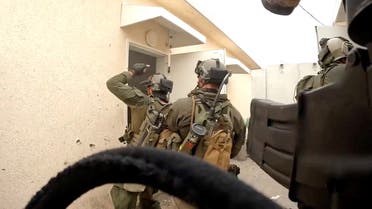 Members of the Flotilla 13 elite unit conduct an operation at a location given as Sufa Military Post, Israel in this screen grab obtained from a video released on October 13, 2023. (Reuters)