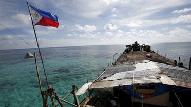 A Philippine flag flutters from BRP Sierra Madre, a dilapidated Philippine Navy ship that has been aground since 1999 and became a Philippine military detachment on the disputed Second Thomas Shoal, part of the Spratly Islands, in the South China Sea. (File photo: Reuters)
