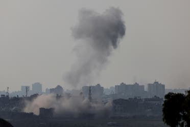 Smoke is seen rising in Gaza from a viewpoint in Southern Israel October 23, 2023. (Reuters)