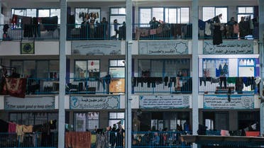 Displaced Palestinians reside at an UNRWA-run school in Khan Yunis in the southern of Gaza Strip, on October 16, 2023. (AFP)