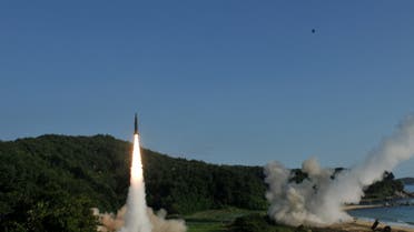 FILE PHOTO: United States and South Korean troops utilizing the Army Tactical Missile System (ATACMS) and South Korea's Hyunmoo Missile II, fire missiles into the waters of the East Sea, off South Korea, July 5, 2017. 8th United States Army/Handout via REUTERS ATTENTION EDITORS - THIS IMAGE WAS PROVIDED BY A THIRD PARTY/File Photo