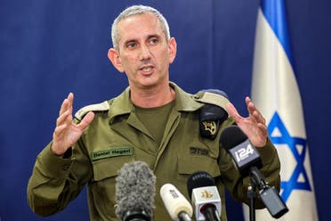 Israeli army spokesman Rear Admiral Daniel Hagari speaks to the press from The Kirya, which houses the Israeli Ministry of Defense, in Tel Aviv on October 18, 2023. (AFP)