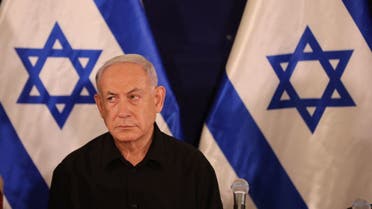 Israeli Prime Minister Benjamin Netanyahu attends a press conference in the Kirya military base in Tel Aviv on October 28, 2023 amid ongoing battles between Israel and the Palestinian group Hamas. (Pool via AFP)