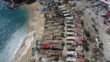 Damaged buildings are seen by the Caleta beach in the aftermath of Hurricane Otis, in Acapulco, Mexico, October 29, 2023. REUTERS/Quetzalli Nicte-Ha