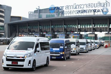 The motorcade carrying bodies of Thai migrant agricultural workers who were killed in an attack by the Palestinian militant group Hamas on Israel, leaves Bangkok's Suvarnabhumi Airport, Thailand, October 20, 2023. (Reuters)