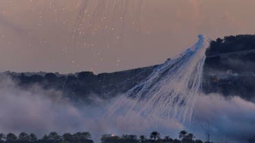 Shells that appears to be white phosphorus from Israeli artillery explode over Dahaira, a Lebanese border village with Israel, south Lebanon, on Oct. 16, 2023. (File photo: AP)