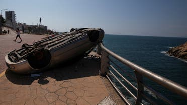 FILE PHOTO: A damaged car is seen, in the aftermath of Hurricane Otis, in Acapulco, Mexico, October 30, 2023. REUTERS/Quetzalli Nicte-Ha/File Photo