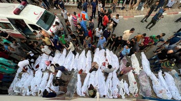 Bodies of Palestinians killed in Israeli strikes on houses in Jabalia refugee camp, lie at a hospital in the northern Gaza Strip, October 31, 2023. (Reuters)