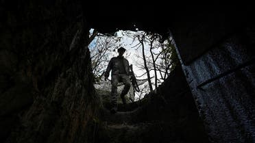 A Ukrainian serviceman enters a dugout at a position in a frontline amid Russia s attack on Ukraine in Zaporizhzhia region, Ukraine November 3 2023 REUTERSStringer TPX IMAGES OF THE DAY