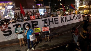 Journalists and activists call for justice and protection of media workers during an indignation rally following the killing of Filipino radio journalist Percival Mabasa, in Quezon City, Philippines, on October 4, 2022.  (Reuters)