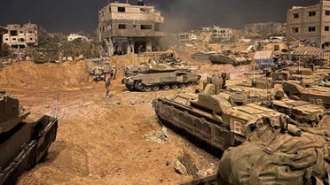 Armoured vehicles of the Israel Defense Forces (IDF) are seen during their ground operations at a location given as Gaza, as the conflict between Israel and the Palestinian group Hamas continues, in this handout image released on November 1, 2023. (Reuters)