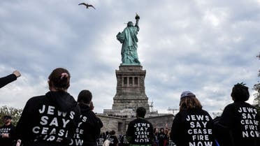 Activists from Jewish Voice for Peace return to the ferry after occupying the pedestal of the Statue of Liberty on November 6, 2023 in New York City. (Reuters)