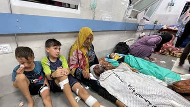 Palestinians who were wounded after a convoy of ambulances was hit, are assisted at Shifa hospital in Gaza City, November 3, 2023. (Reuters)