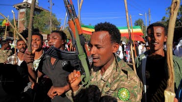 Members of the Amhara Special Forces dance during the annual St. George’ Day celebra-tions at the Saint George rock-hewn church in the Lalibela town of the Amhara Region, Ethiopia, on January 25, 2022. (Reuters)