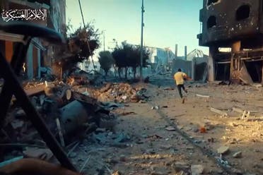 An image grab from a handout video released by the Hamas Media Office on November 8, 2023, show what it says are battles between al-Qassam Brigades fighters and Israeli ground forces in the northern and southern axes of Gaza City on November 7 and 8. (AFP)