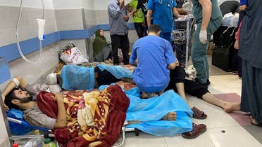 Palestinian wounded in an Israeli strike rest at Al Shifa hospital in Gaza City, on November 7, 2023. (Reuters)