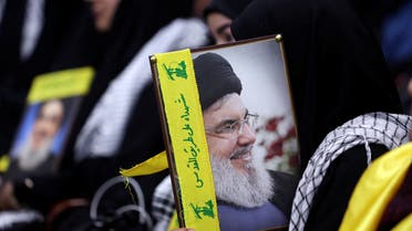 Supporters of Lebanon's Hezbollah leader Sayyed Hassan Nasrallah gather to listen to his address during a rally commemorating the annual Hezbollah Martyrs' Day in Beirut's southern suburbs, Lebanon November 11, 2023. REUTERS/Aziz Taher