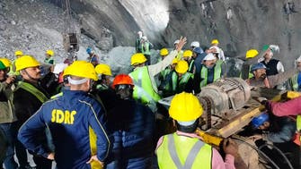 Rescue workers send medicine to 40 men trapped inside India tunnel for four days 