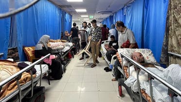 Patients and internally displaced people are pictured at Al-Shifa Hospital in Gaza City on November 10, 2023, amid ongoing battles between Israel and the Palestinian Hamas movement. (AFP)