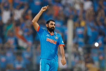 India’s Mohammed Shami celebrates after taking the wicket of New Zealand’s Lockie Ferguson, caught out by KL Rahul to win the match and advance to the finals of the ICC Cricket World Cup 2023 at the Wankhede Stadium, Mumbai, India, on November 15, 2023. (Reuters) 