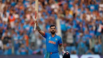 Kohli and Shami lead India into Cricket World Cup final after 70-run win over NZ