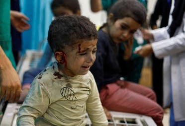 Palestinian children wounded in Israeli strikes amid the ongoing conflict between Israel and Palestinian group Hamas wait to receive treatment at Nasser hospital in Khan Younis in the southern Gaza Strip November 12, 2023. (Reuters)