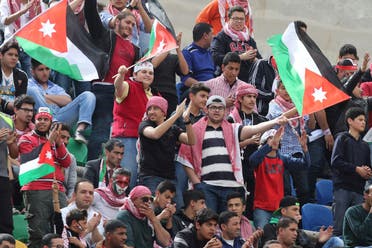 Jordanian supporters cheer up their team during their World Cup 2018 Asian qualifying football match against Bangladesh on March 24, 2016 in the capital Amman. Jordan won 8-0. (AFP)