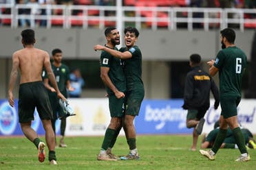Pakistan’s players celebrate their win at the 2026 FIFA World Cup qualifiers football match between Pakistan and Cambodia, at the Jinnah Sports stadium in Islamabad on October 17, 2023. (AFP)