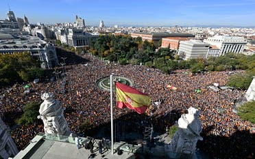 Tens of thousands of people demonstrate during a protest called by Foro Libertad y Alternativa (Freedom & Alternative forum) against an amnesty bill for people involved with Catalonia’s failed 2017 independence bid, in Madrid on November 18, 2023. (AFP)