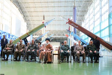 This handout picture provided by the office of Iran’s Supreme Leader Ali Khamenei shows him (C) speaking during a visit at the IRGC aerospace achievement exhibition in Tehran on November 19, 2023. (AFP)