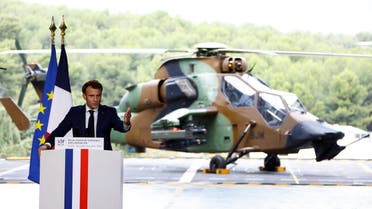 French President Emmanuel Macron delivers a speech on defence strategy to present the La Revue nationale strategique (RNS), a new military programming law (2024-2030), during a visit on the amphibious helicopter carrier Dixmude docked in the French Navy base of Toulon, France, November 9, 2022. REUTERS/Eric Gaillard/Pool
