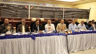 Pakistani businessman, Jawed Bilwani (4th left), speaks during a press conference along with Karachi Chamber of Commerce & Industry President Iftikhar Ahmed Sheikh (5th left) in Karachi on November 21, 2023. (AN Photo)