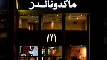 A worker walks inside an empty McDonald's restaurant as a result of the boycott of Western brands in Egypt due to the Israeli bombardment in Gaza amid the ongoing conflict between Israel and the Palestinian militia group Hamas, in Cairo, Egypt, November 20, 2023. (Reuters)