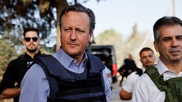 British Foreign Secretary David Cameron and Israeli Foreign Minister Eli Cohen visit Kibbutz Beeri following the October 7 deadly attack by Palestinian group Hamas, in southern Israel, November 23, 2023. (Reuters)