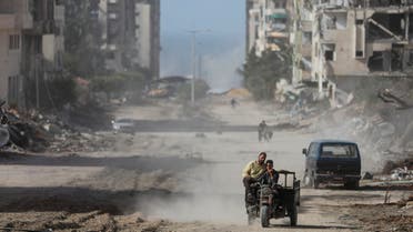 Palestinians drive through Gaza City on Sunday, Nov. 26, 2023. on the third day of the temporary ceasefire between Hamas and Israel. (AP Photo/Mohammed Hajjar)