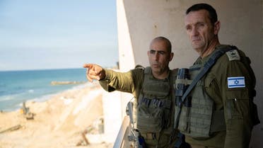 Israeli army Chief of Staff, Herzi Halevi listens to an officer as he visited soldiers during the ongoing ground operation of the Israeli army against Palestinian group Hamas, in a location given as Gaza, in this handout image released on November 16, 2023. (Reuters)