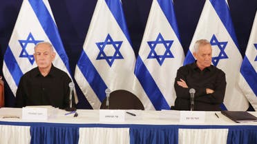 Israeli prime minister Benjamin Netanyahu, Defense Minister Yoav Gallant and Cabinet Minister Benny Gantz speak during a news conference in the Kirya military base in Tel Aviv, Israel on Saturday, Oct. 28, 2023. (Abir Sultan/Pool Photo via AP)
